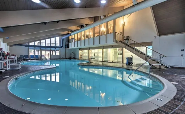 a view of lake with mountain in background