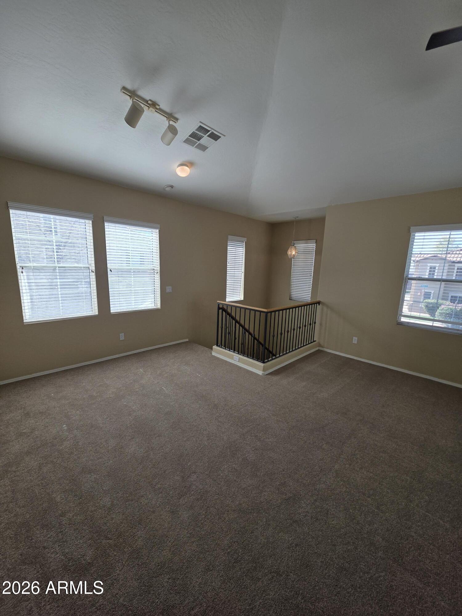 942 West Aspen Way Gilbert, AZ 85233 - Photo 11 of 18 a view of an empty room with a window