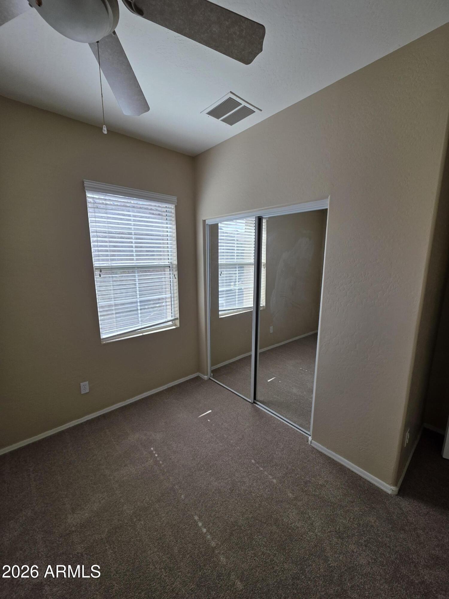 942 West Aspen Way Gilbert, AZ 85233 - Photo 13 of 18 an empty room with windows