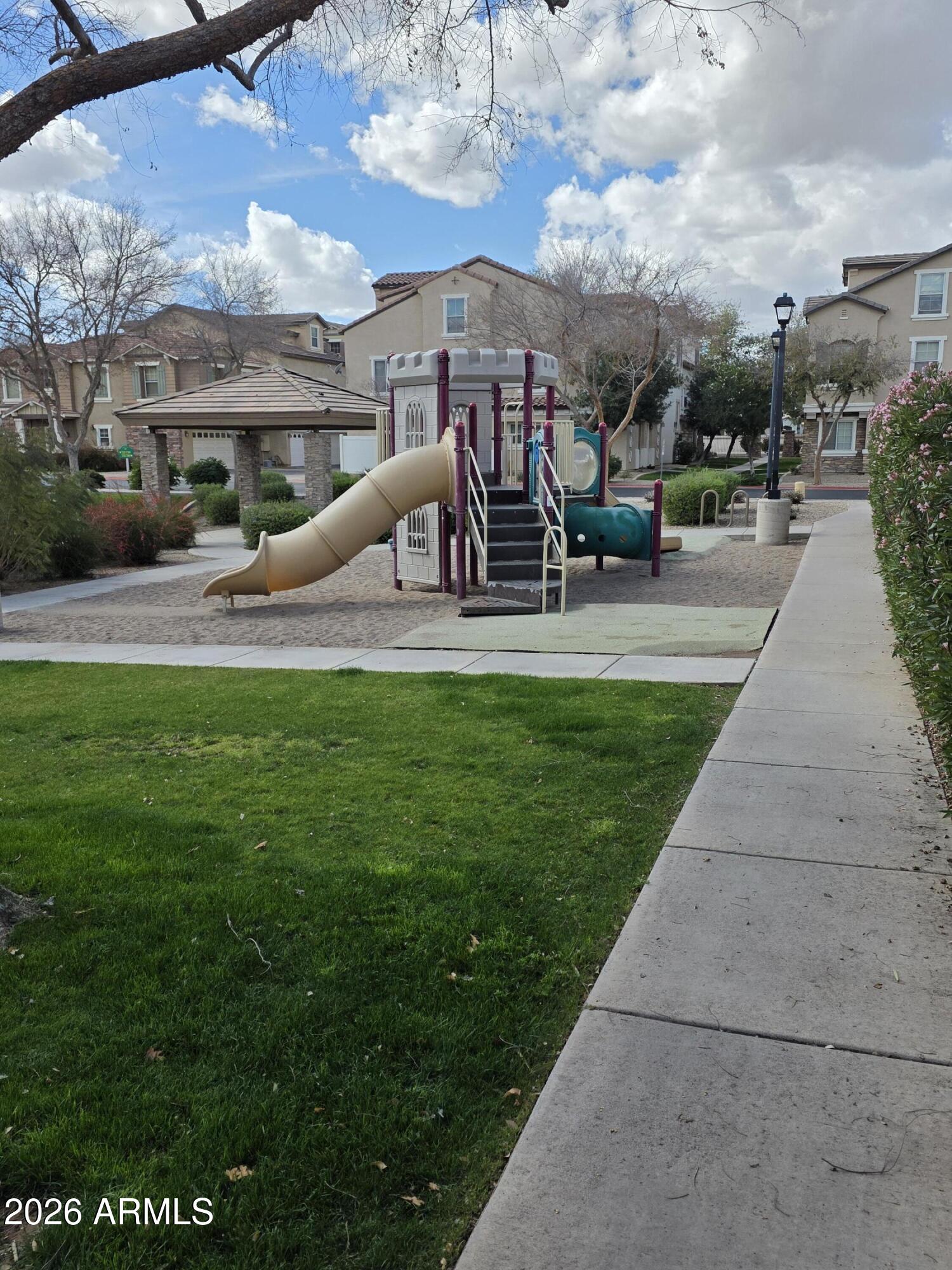 942 West Aspen Way Gilbert, AZ 85233 - Photo 16 of 18 a view of a park with sitting area