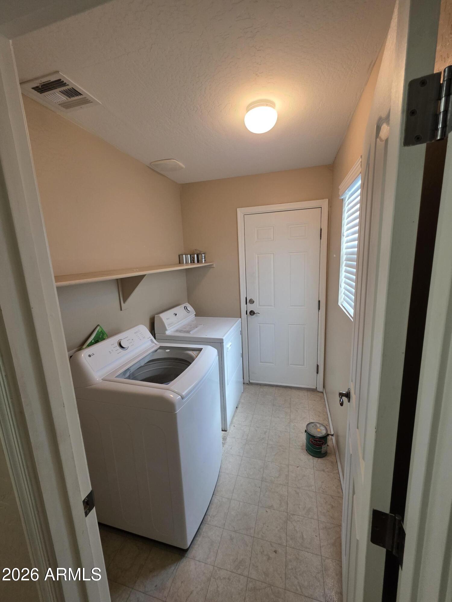 942 West Aspen Way Gilbert, AZ 85233 - Photo 5 of 18 a room with storage and utility