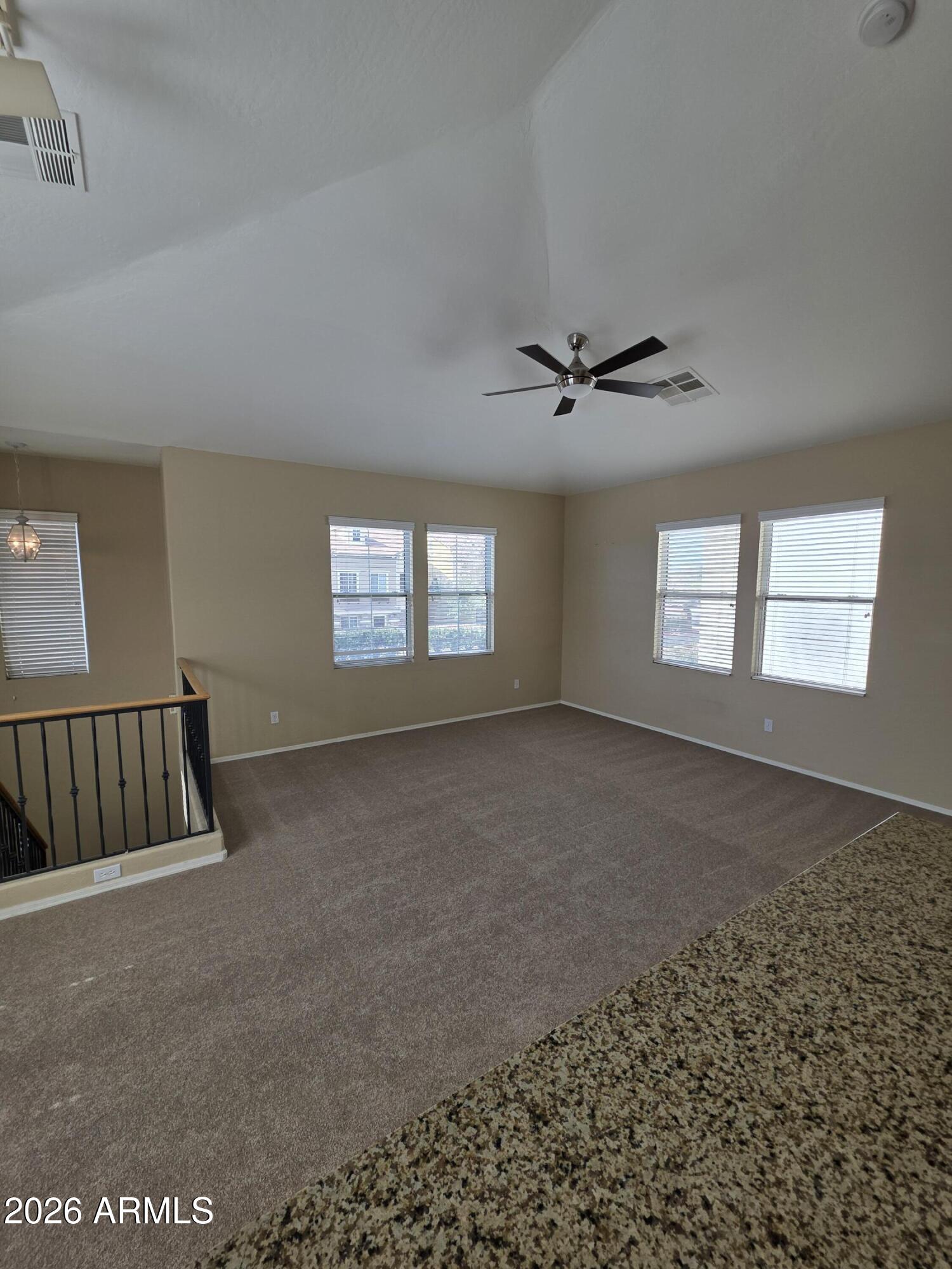 942 West Aspen Way Gilbert, AZ 85233 - Photo 10 of 18 a view of an empty room with a window