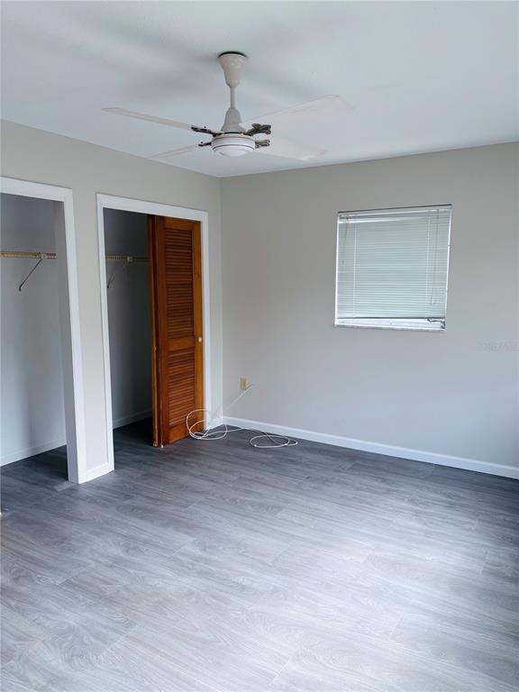 33 Spring Loop Ocala, FL 34472 - Photo 12 of 28 a view of an empty room with closet and workspace