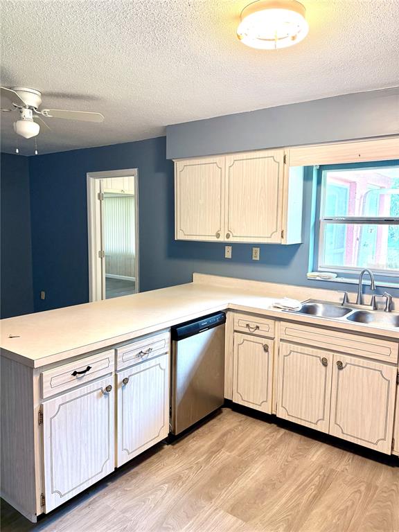 33 Spring Loop Ocala, FL 34472 - Photo 9 of 28 a kitchen with granite countertop white cabinets and a large window