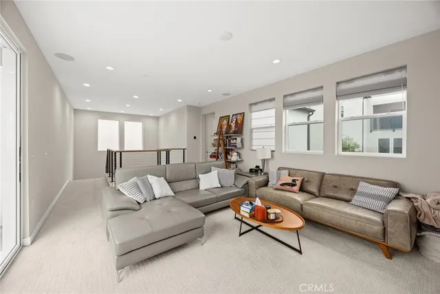 an outdoor space with furniture and umbrella