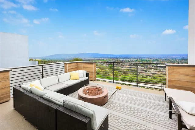 a view of an outdoor sitting area with furniture