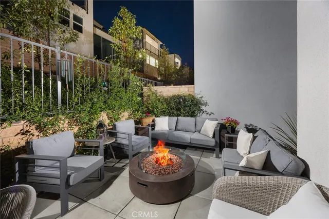 a view of a swimming pool with a lounge chair