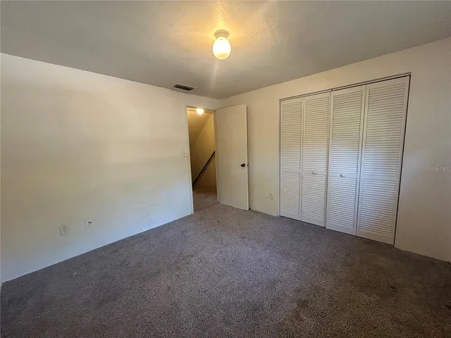 an empty room with a bathroom
