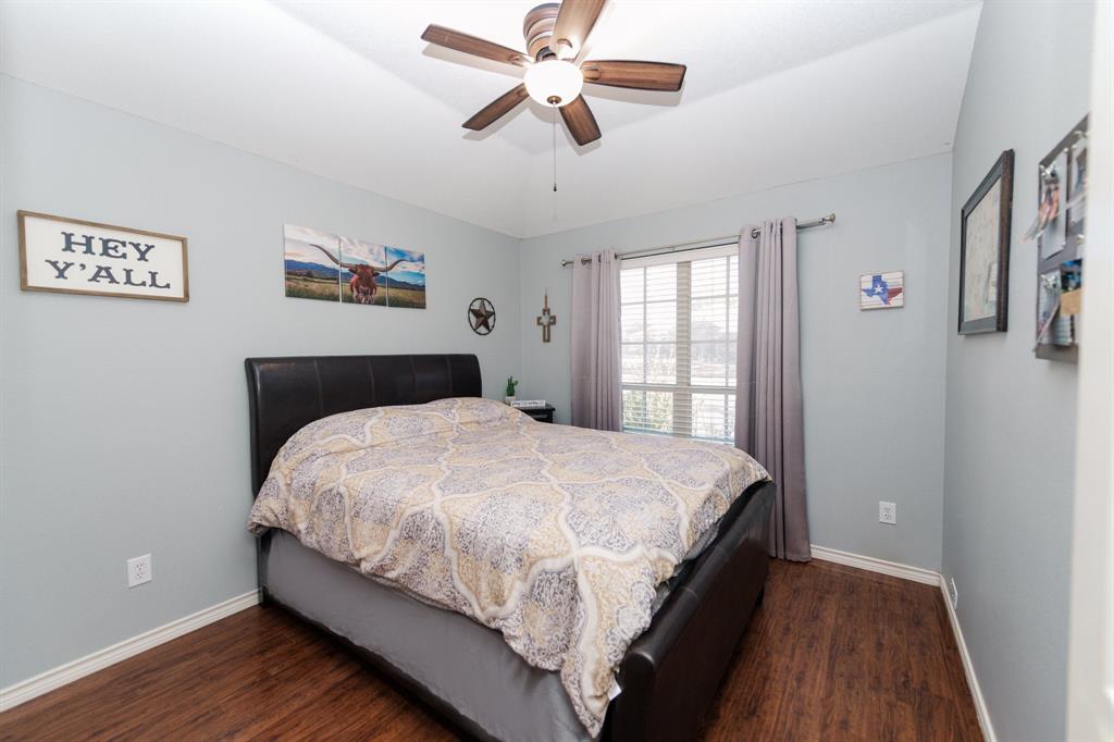 2107 Lacebark Lane Rockwall, TX 75087 - Photo 15 of 34 a bedroom with bed and window