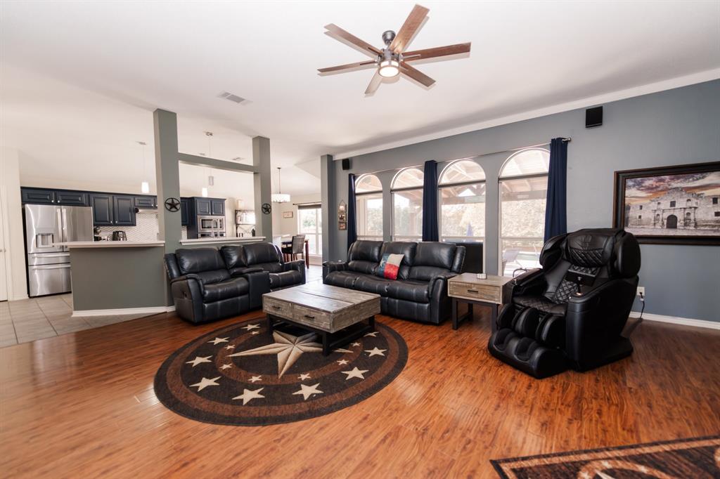 2107 Lacebark Lane Rockwall, TX 75087 - Photo 2 of 34 a living room with furniture window and wooden floor
