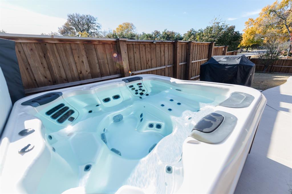 2107 Lacebark Lane Rockwall, TX 75087 - Photo 23 of 34 a view of a chairs and tables in the backyard