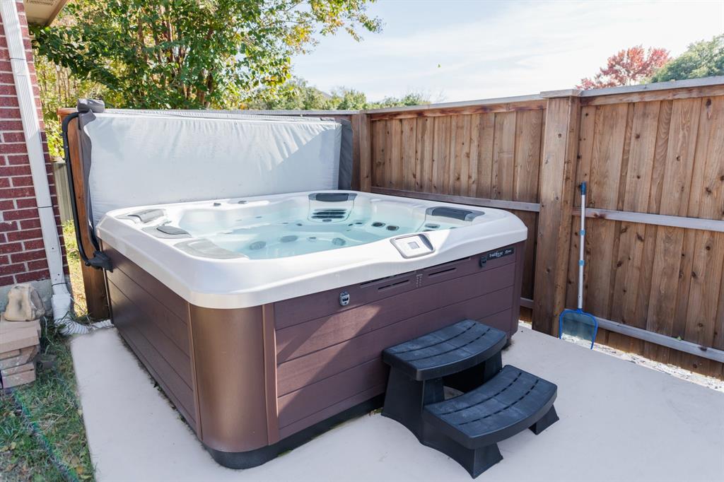 2107 Lacebark Lane Rockwall, TX 75087 - Photo 24 of 34 an outdoor sitting area with a tub