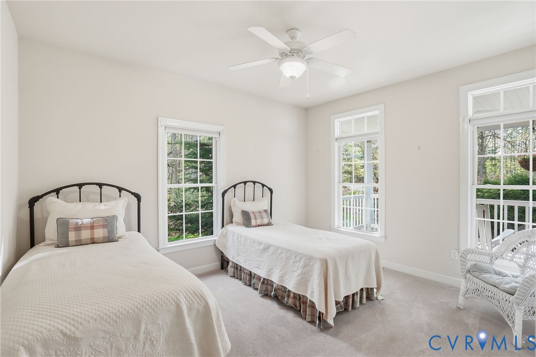 14430 Overlook Ridge Lane Beaverdam, VA 23015 - Photo 42 of 71 a bedroom with a large bed and a window