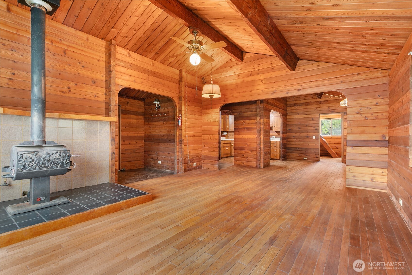 5950 Truck Road Deming, WA 98244 - Photo 7 of 23 a view of a bathroom with wooden floor and a potted plant