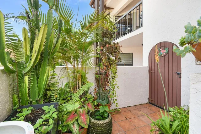 a view of game room with window and furniture