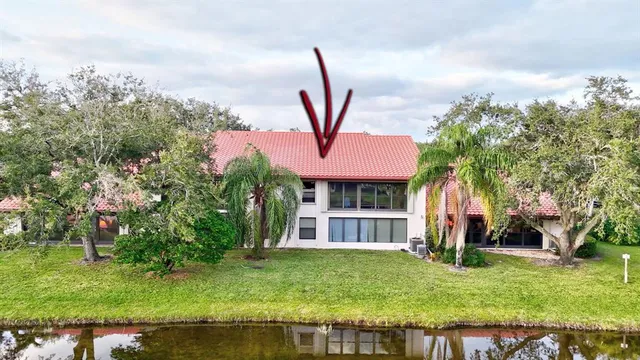 an aerial view of a house with a garden
