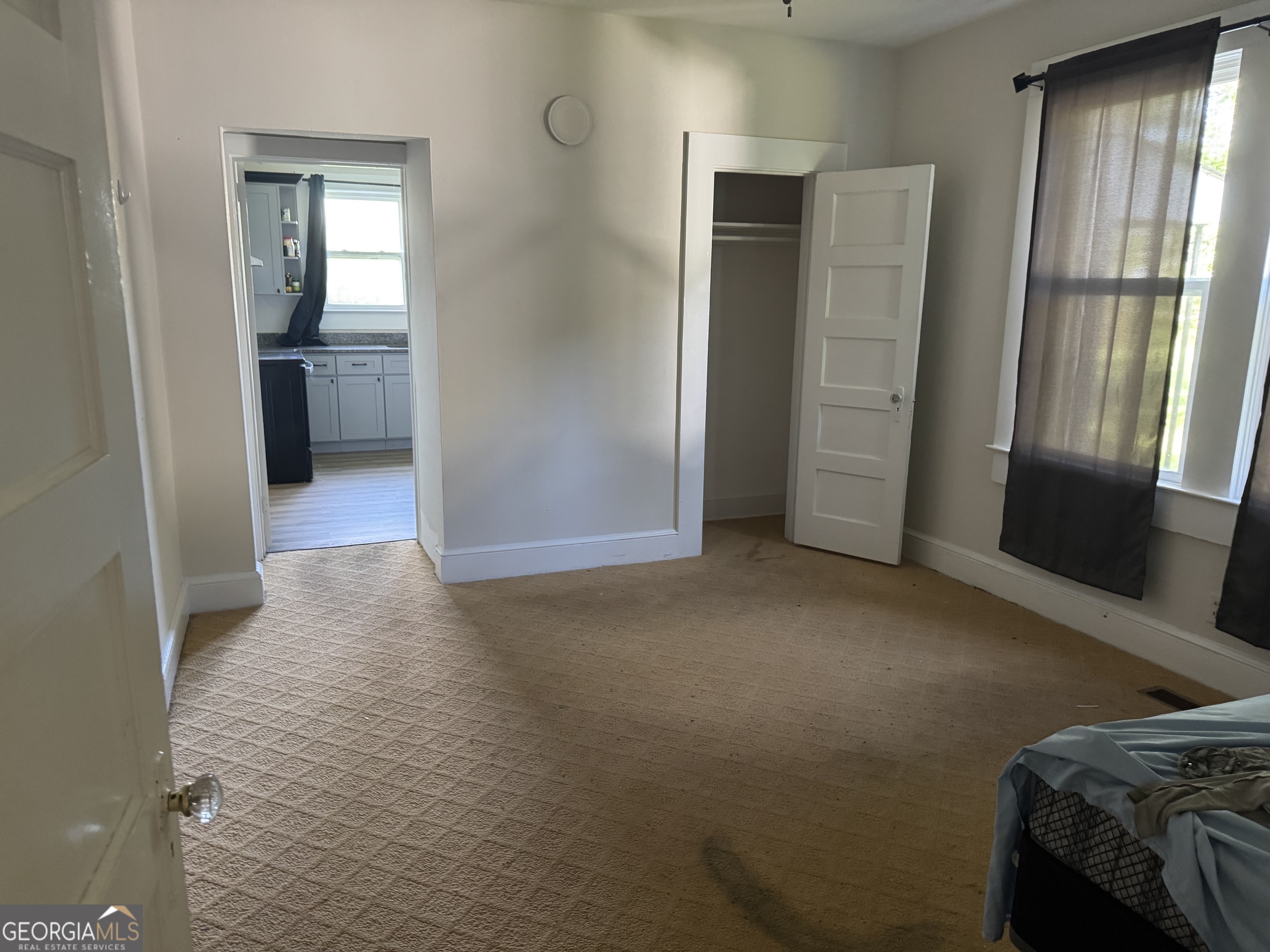 968 Elbert Street Elberton, GA 30635 - Photo 7 of 10 an empty room with windows and closet