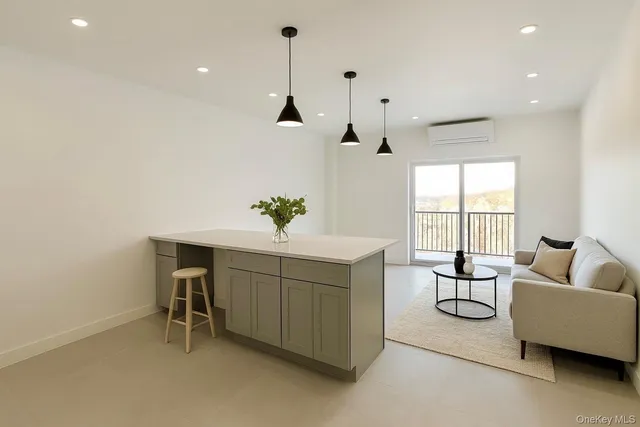 a living room with furniture and window