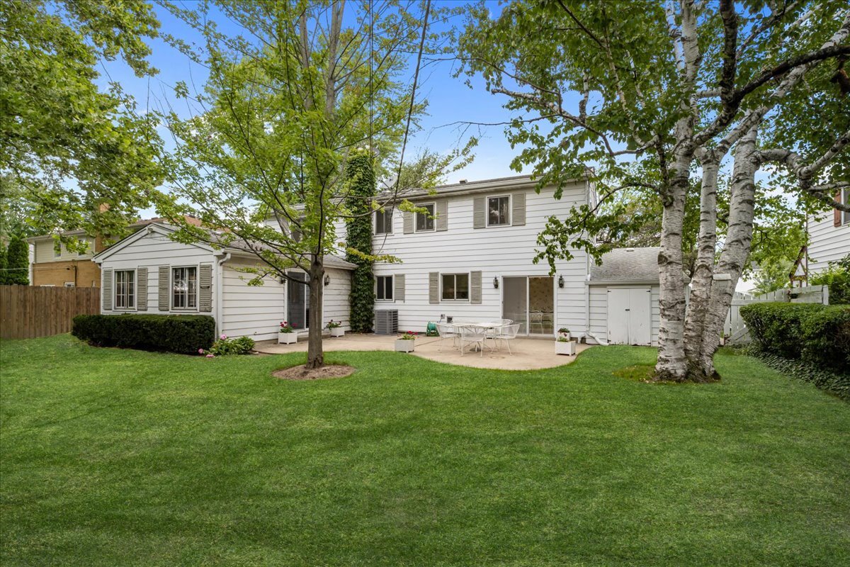 1505 Hackberry Road Deerfield, IL 60015 - Photo 16 of 19 a view of a house with a yard and sitting area