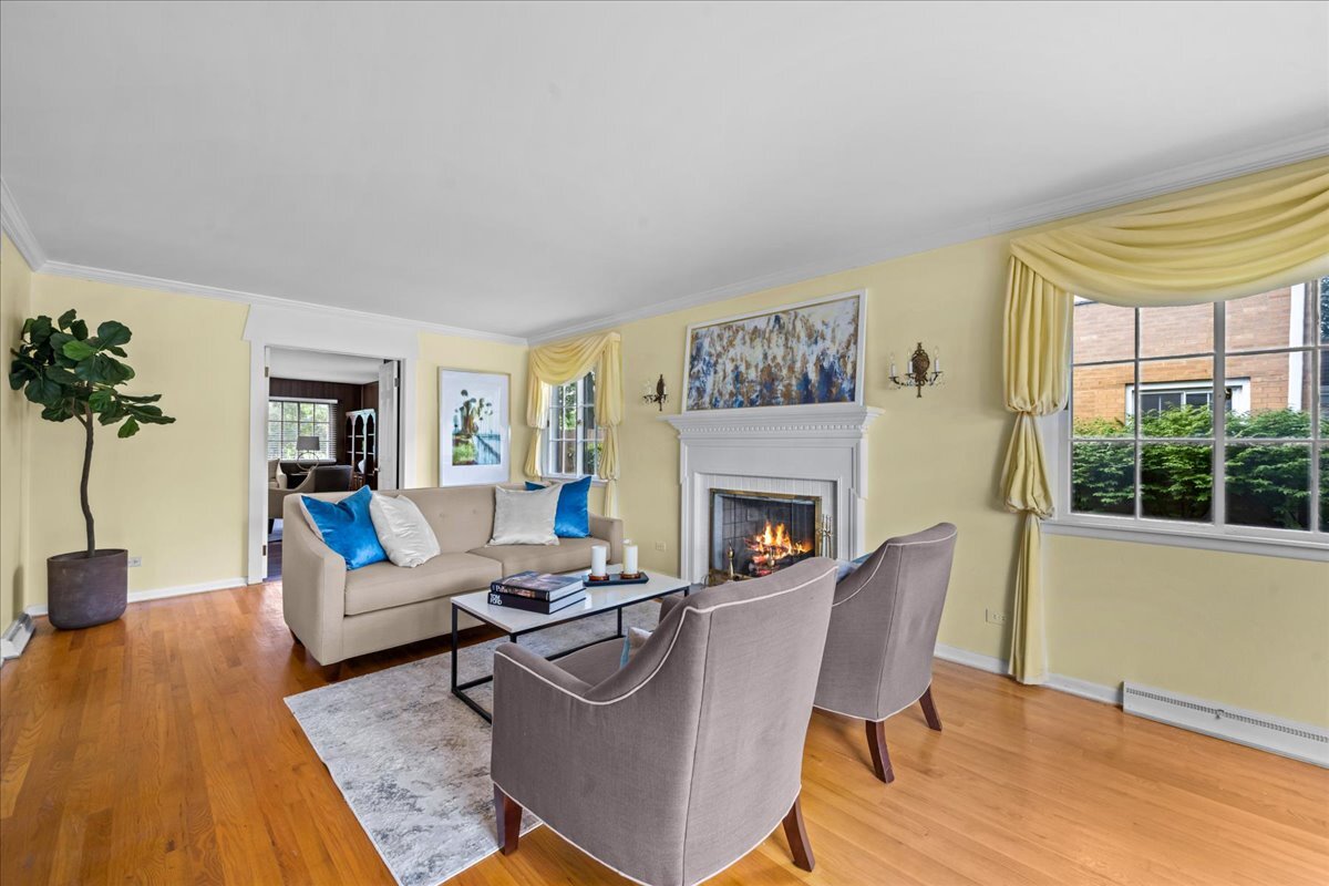 1505 Hackberry Road Deerfield, IL 60015 - Photo 3 of 19 a living room with furniture and a fireplace