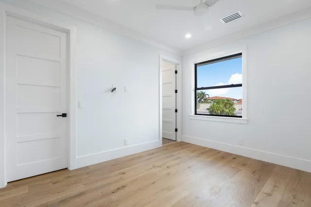 a view of a lake with a yard