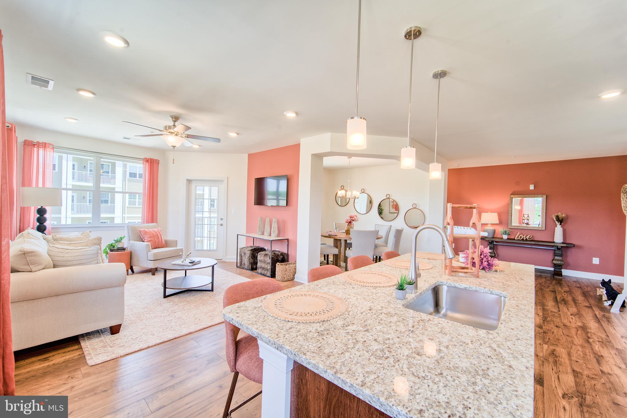 a view of a living room and dining room