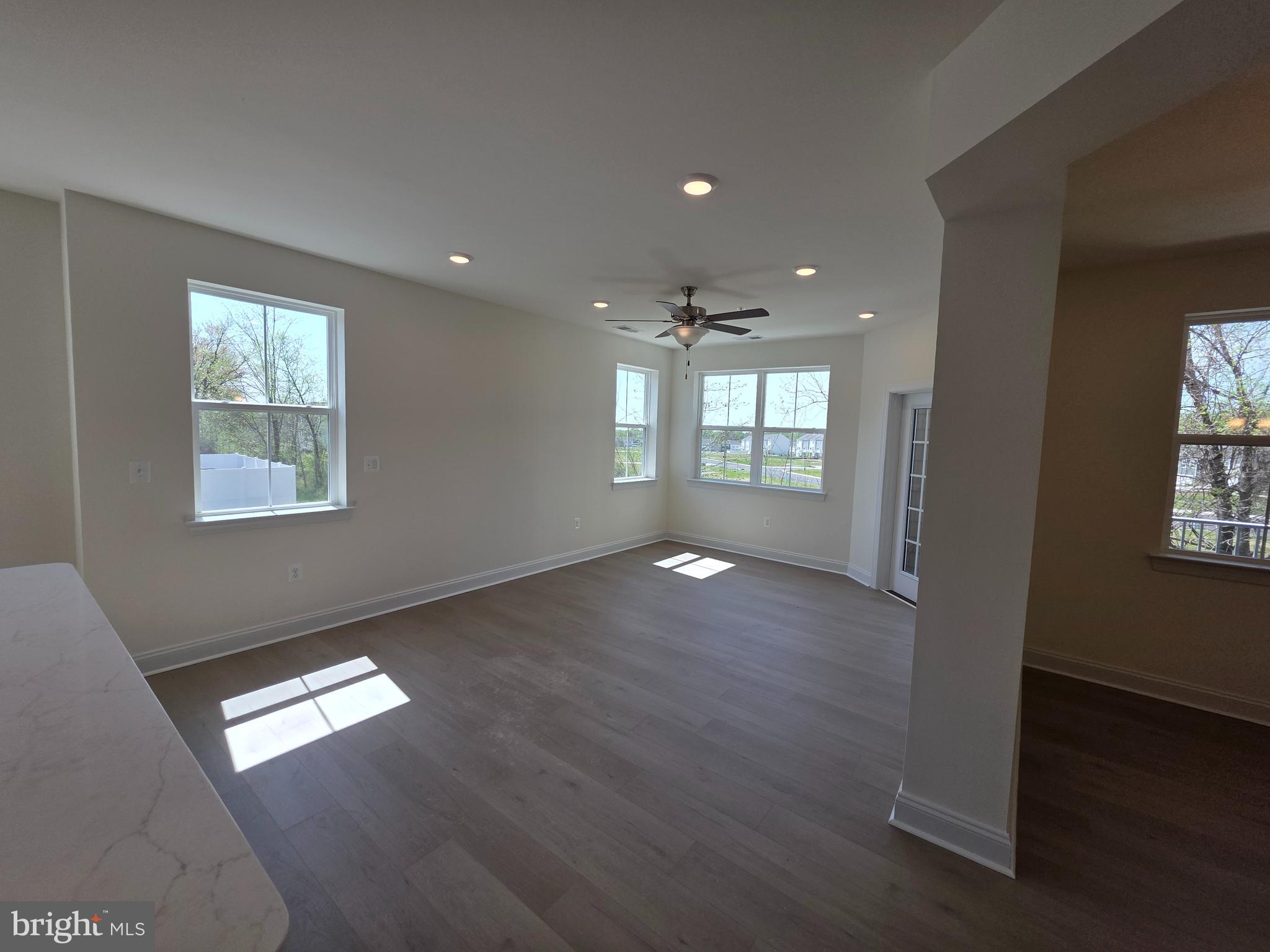 404 Bold Ruler Court, Unit 201 Havre de Grace, MD 21078 - Photo 27 of 43 a view of empty room with wooden floor and fan