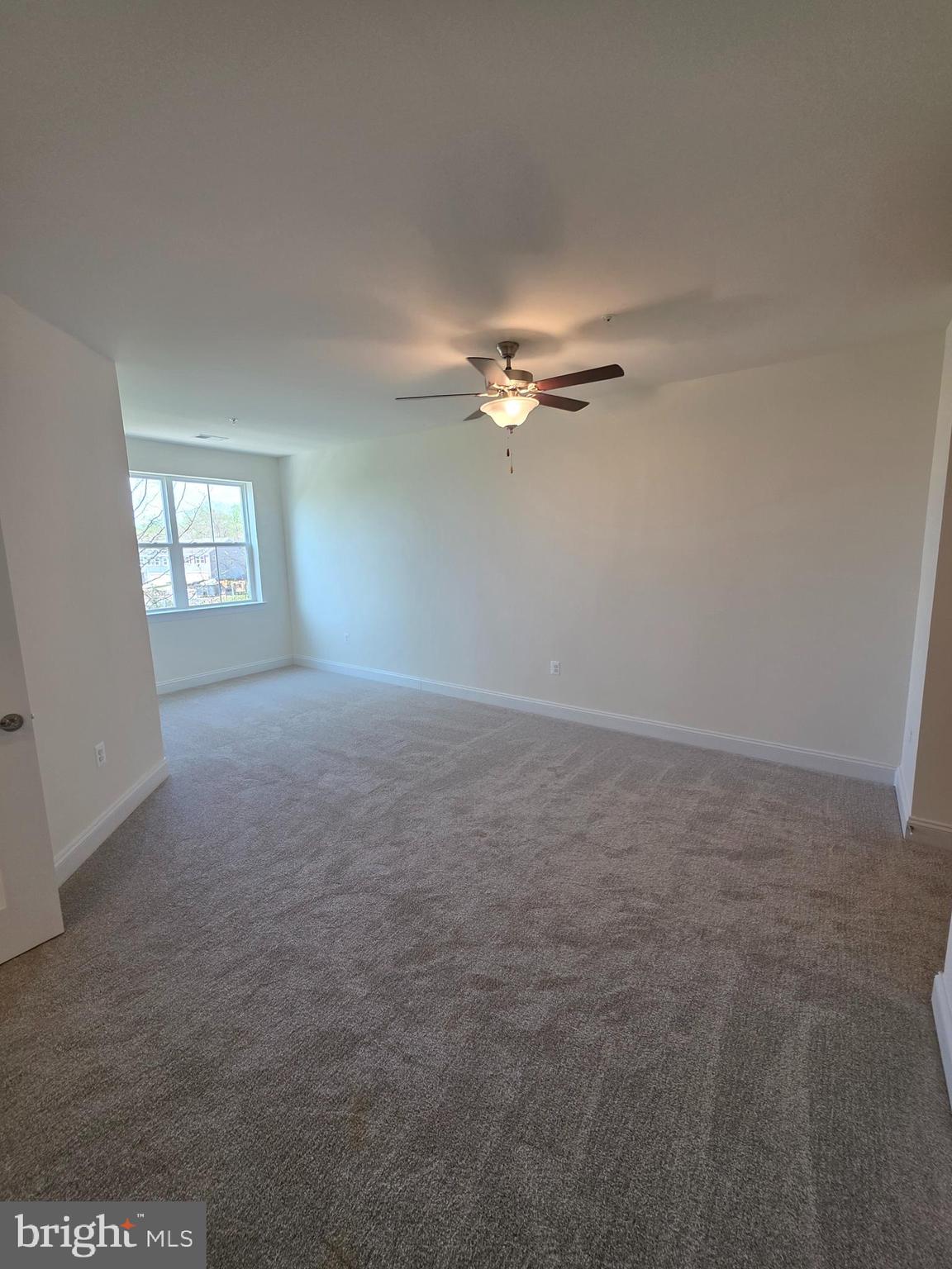 404 Bold Ruler Court, Unit 201 Havre de Grace, MD 21078 - Photo 34 of 43 a view of a livingroom with a fan