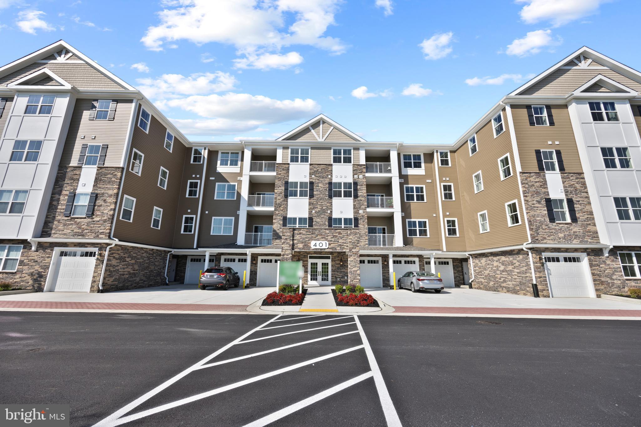 404 Bold Ruler Court, Unit 201 Havre de Grace, MD 21078 - Photo 43 of 43 a view of building with lot of street and trees