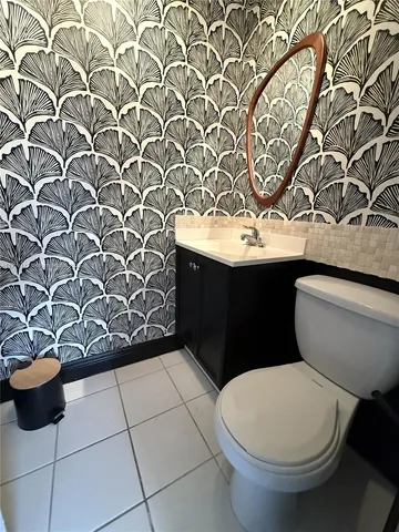 a bathroom with a toilet and a sink