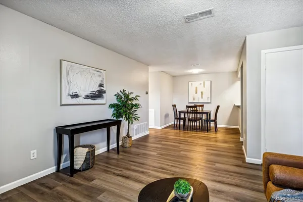 a dining room with furniture and a table