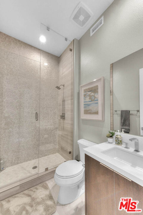 20558 Overlook Court Porter Ranch, CA 91326 - Photo 13 of 48 a bathroom with a sink a toilet and shower
