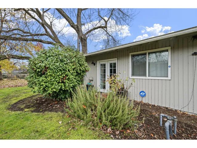 a front view of a house with yard