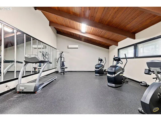 a view of room with gym equipment