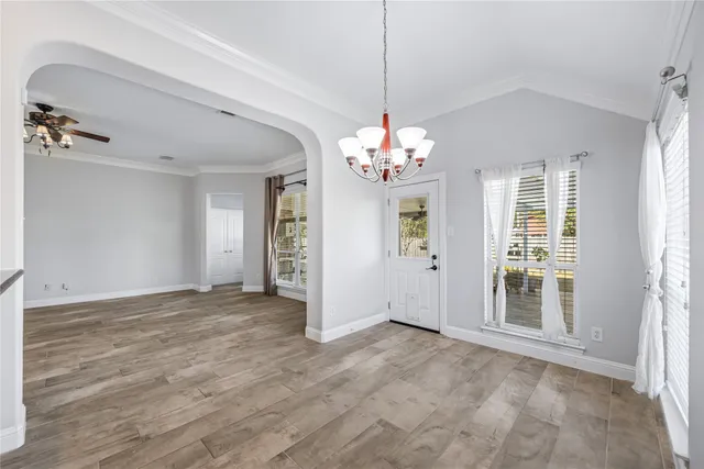 a kitchen with stainless steel appliances granite countertop a stove sink and cabinets