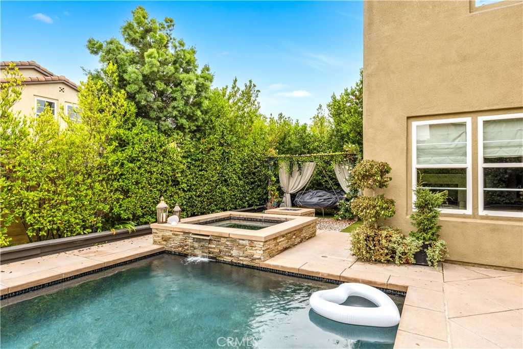 27292 Via Priorato San Juan Capistrano, CA 92675 - Photo 1 of 42 a view of a house with pool and sitting area