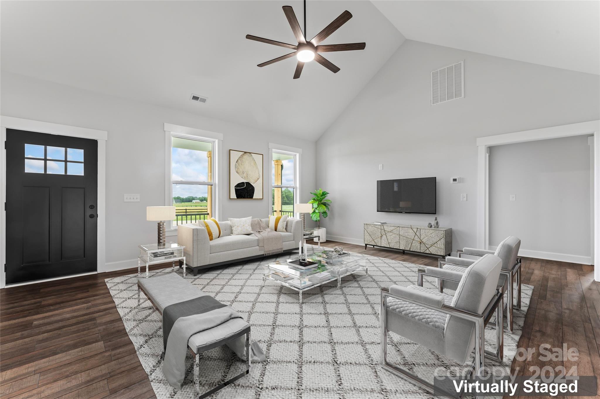 254 Briggs Road Salisbury, NC 28147 - Photo 5 of 41 a living room with furniture and a flat screen tv