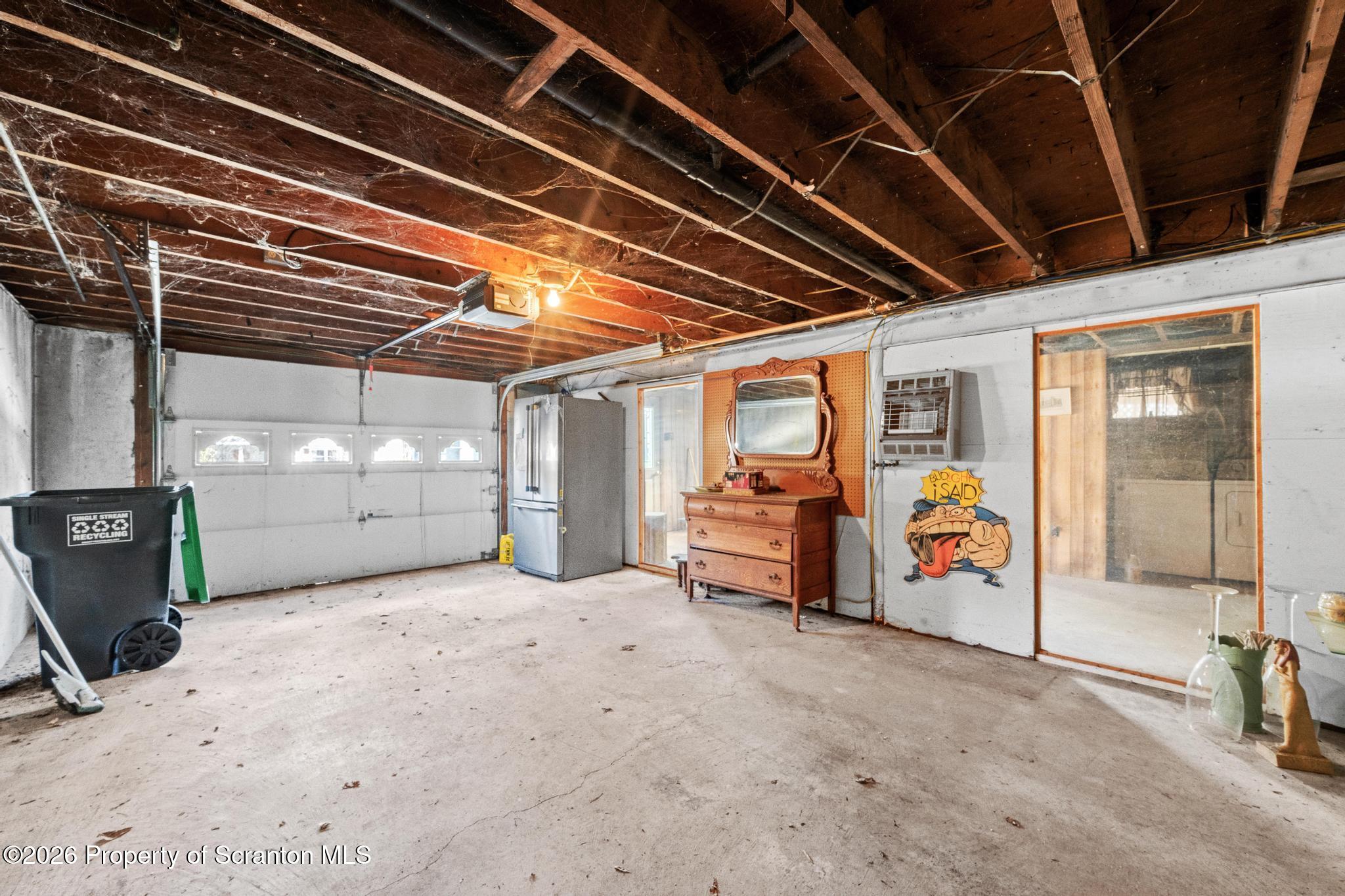 82 Jubilee Road Gouldsboro, PA 18424 - Photo 20 of 39 a view of a garage with table and chairs