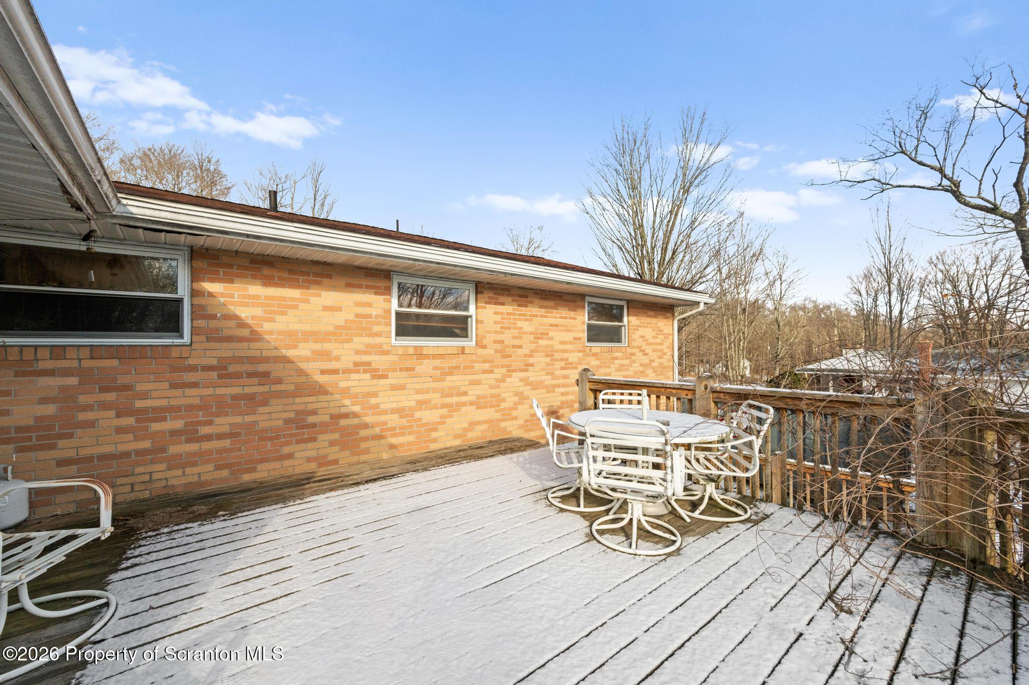 82 Jubilee Road Gouldsboro, PA 18424 - Photo 28 of 39 a view of a terrace with chairs