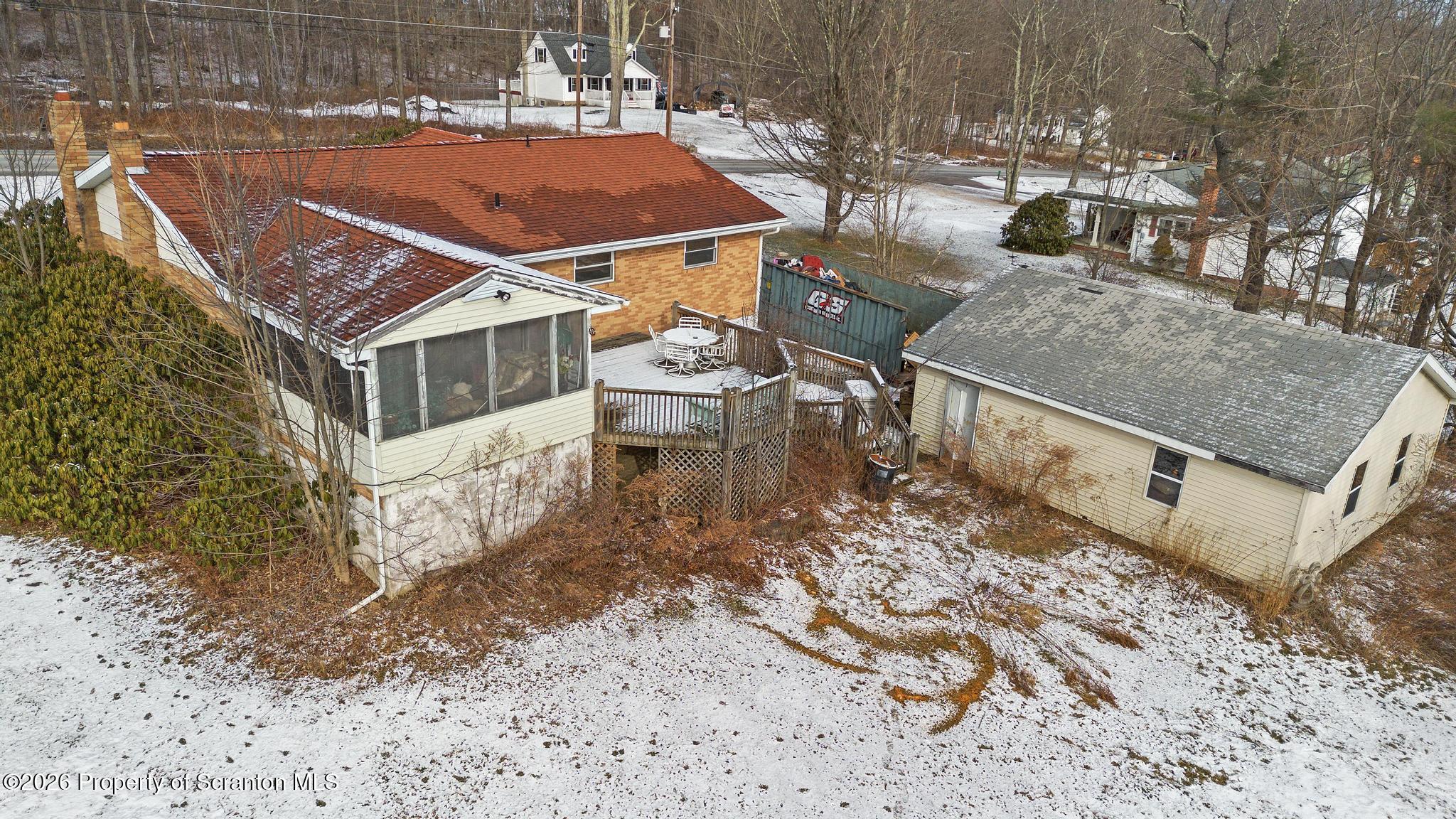 82 Jubilee Road Gouldsboro, PA 18424 - Photo 38 of 39 a aerial view of a house with a yard