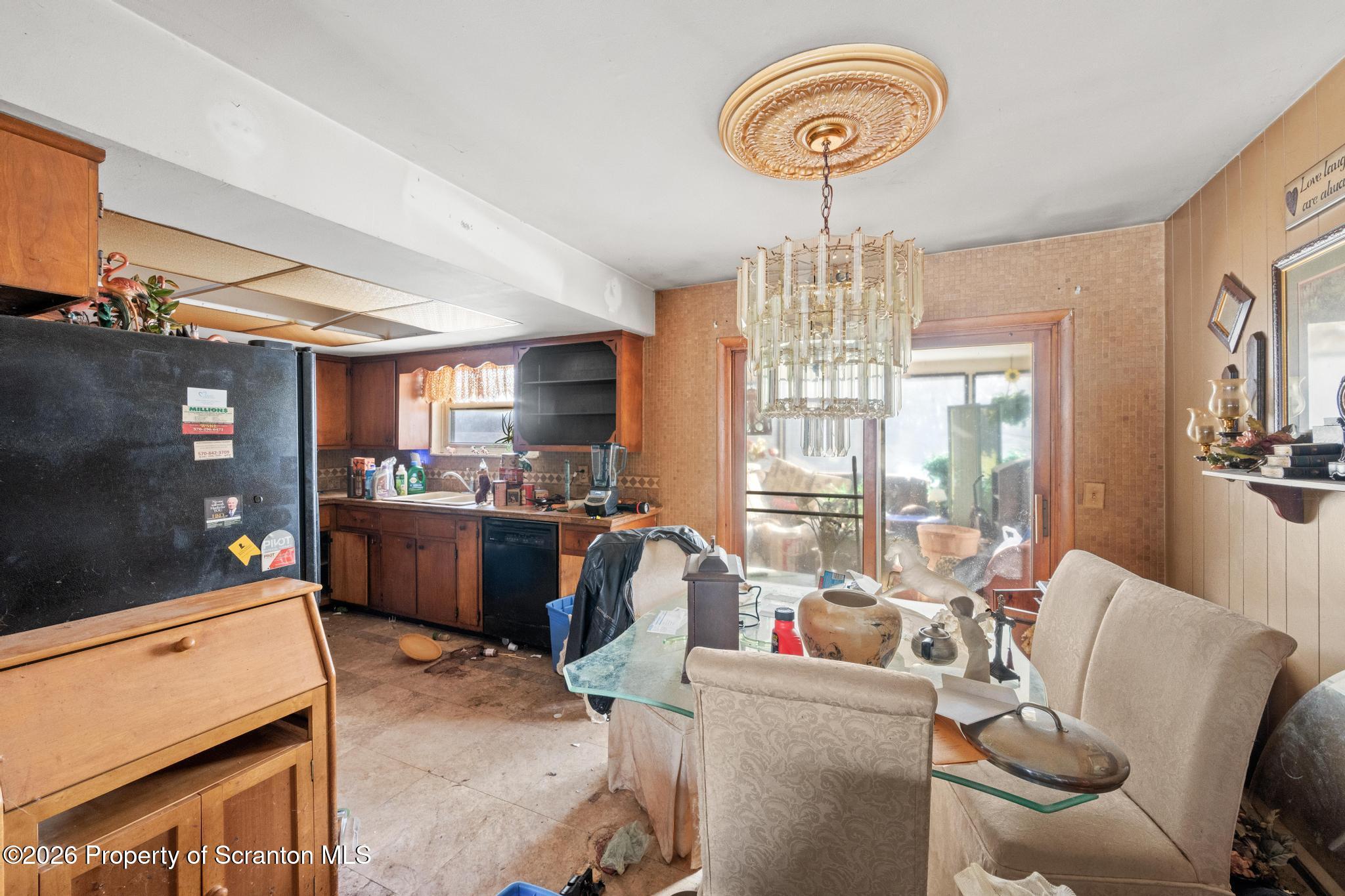 82 Jubilee Road Gouldsboro, PA 18424 - Photo 7 of 39 a view of a dining room with furniture window and outside view