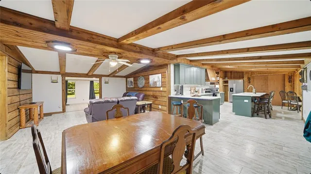 a view of a dining room with furniture