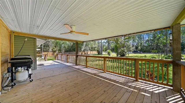 a view of a balcony with chairs