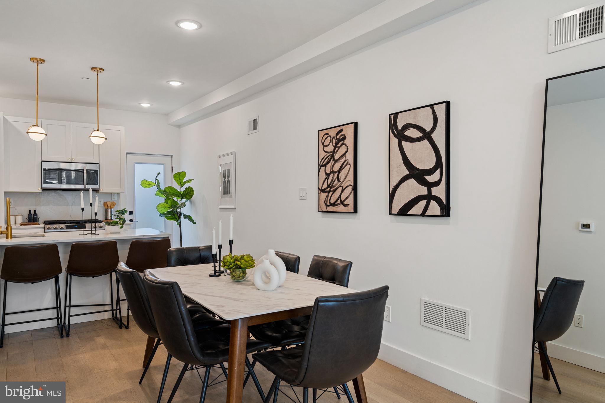 3973 Wyalusing Avenue Philadelphia, PA 19104 - Photo 5 of 39 a view of a dining room with furniture