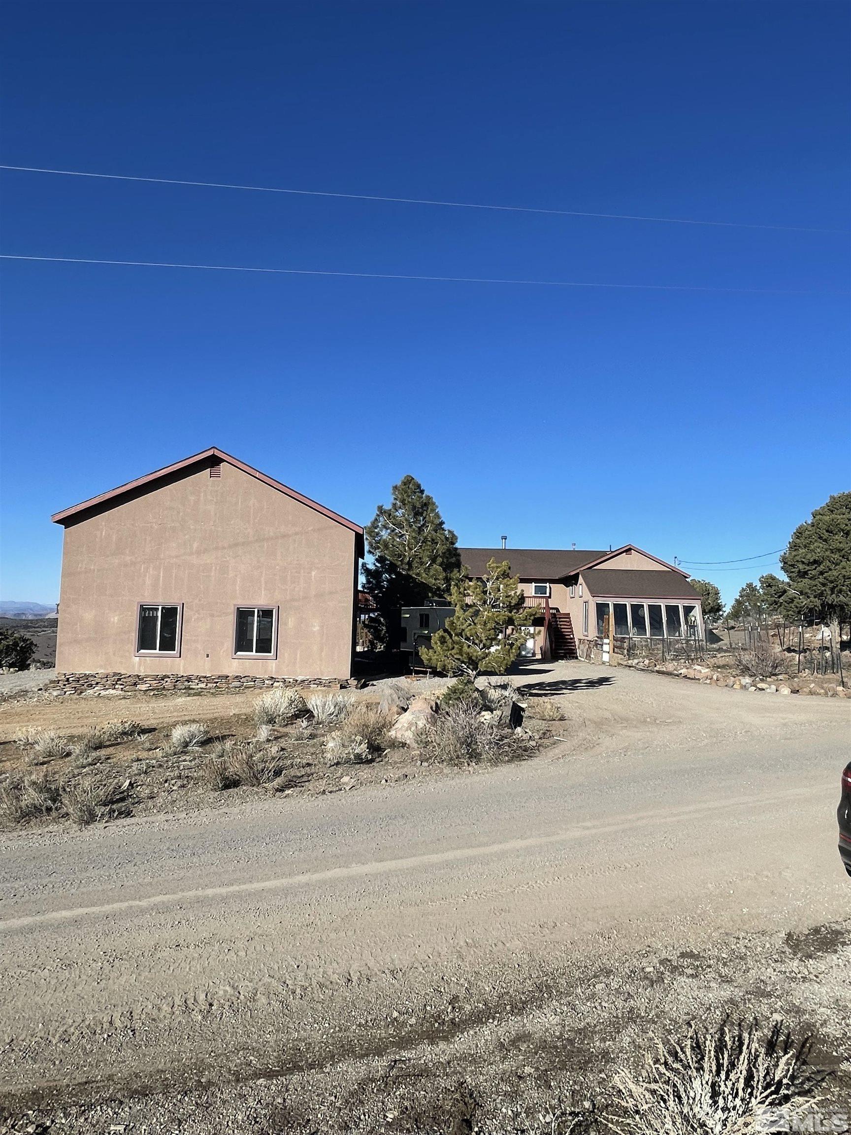 4300 Rocky Road Reno, NV 89521 - Photo 6 of 31 a view of a house with a yard