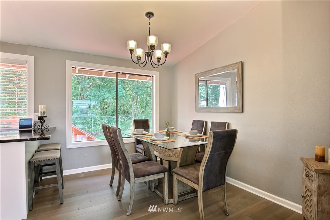 21928 8th Place West Bothell, WA 98021 - Photo 12 of 31 a view of a dining room with furniture window and outside view