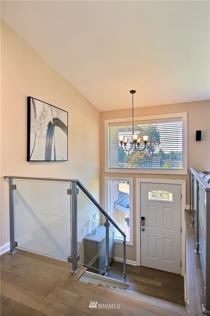 21928 8th Place West Bothell, WA 98021 - Photo 13 of 31 a view of a hallway with windows