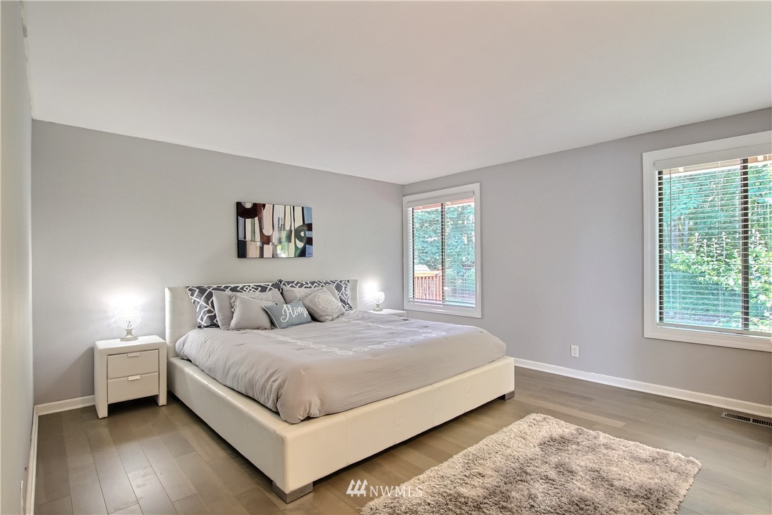 21928 8th Place West Bothell, WA 98021 - Photo 14 of 31 a bedroom with a bed and a window