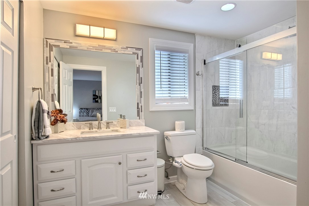 21928 8th Place West Bothell, WA 98021 - Photo 16 of 31 a bathroom with a sink a toilet and shower