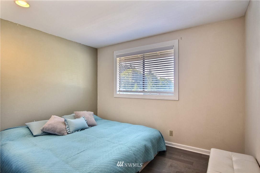 21928 8th Place West Bothell, WA 98021 - Photo 19 of 31 a bedroom with a bed and a window